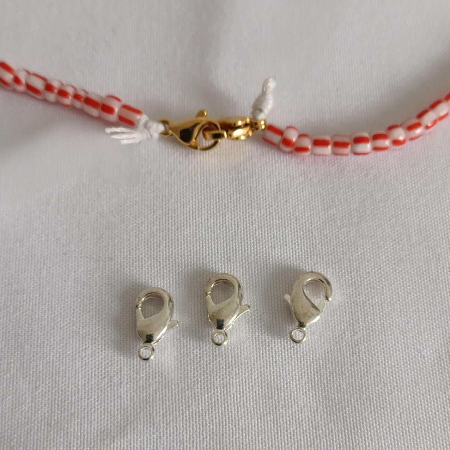 Fermoirs mousquetons argentés pour perles africaines 19, accessoires essentiels pour montage de bijoux personnalisés.